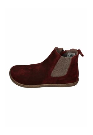 Red suede ankle boot with beige elastic side panel, round toe, pull tab at heel, and brown rubber sole.