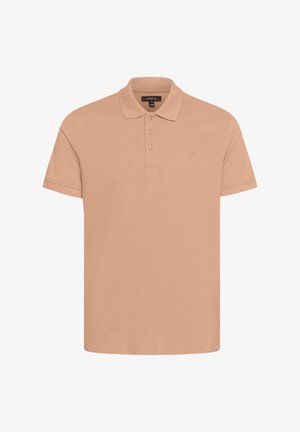 Polo-Shirt in einem hellen Pfirsichton, aus Baumwolle gefertigt, mit Kragen, Dreiknopf-Leiste und kurzen Ärmeln. Dezentes Logo-Detail vorhanden.