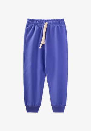 Lila Sweatpants aus weichem Stoff, mit einem elastischen Bund und einer cremefarbenen Kordel sowie schmal zulaufenden Bündchen an den Knöcheln.