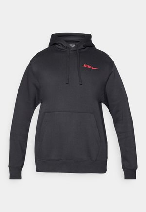 Zwarte capuchontrui van een katoenmix. Heeft een voorzak, ribgebreide manchetten en een rood "ATLETI" logo met een Nike swoosh.