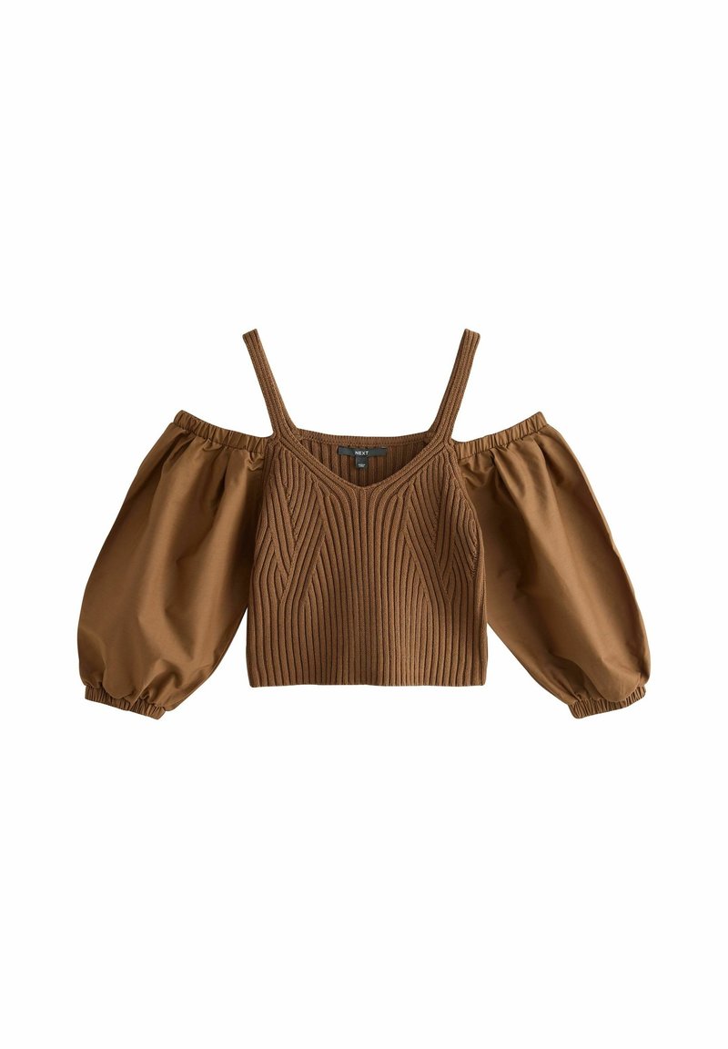 Haut court marron avec corsage en maille côtelée, fines bretelles et manches bouffantes dénudées volumineuses avec poignets élastiques.