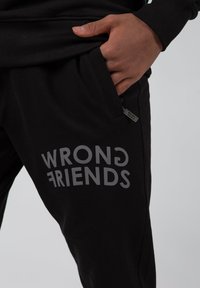 Wrong Friends ORLANDO - Trainingsbroek - zwart