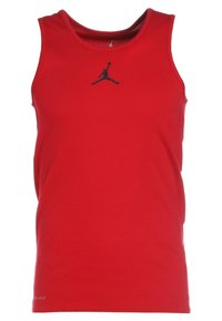 Czerwony sportowy top na ramiączkach wykonany z oddychającego materiału, z czarnym logo Jumpman umieszczonym na środku klatki piersiowej. Bez rękawów, z okrągłym dekoltem.