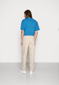 Weekday ROSS WIDE TROUSERS - Chinos - beige