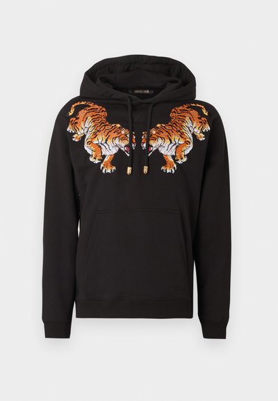 Sweat à capuche noir avec deux tigres orange brodés se faisant face sur la poitrine et une poche kangourou à l'avant.