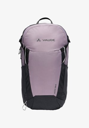 Sac à dos VAUDE violet clair et noir avec poche zippée à l'avant, poignée supérieure, poches latérales, et étiquette "WIZARD 18+4" en bas à droite.