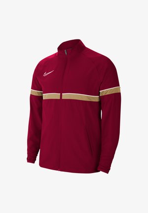 Rote Nike-Jacke mit Stehkragen, goldenem horizontalen Streifen, seitlichen Taschen und durchgehendem Reißverschluss. Glattes Material mit taillierter Passform.