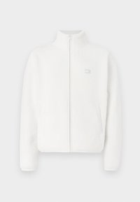 White fleece jacket with high collar, front zipper, and side pockets. Features a small logo in gray on the upper left side. Soft texture.