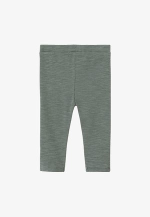 Gerippte Leggings in einem gedämpften Grünton. Verfügt über eine weiche Textur, einen dehnbaren Bund und ein design in voller Länge. Keine sichtbaren Nähte oder Muster.