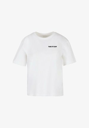 Witte korte mouwen t-shirt van katoen, met een ronde halslijn en de tekst "TAKE IT EASY" in het zwart gedrukt op de voorkant.