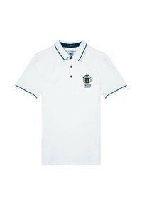 Polo shirt bianco con una patta di bottoni, dettagli neri sul colletto e sulle maniche, con un emblema ricamato sul lato sinistro del petto.