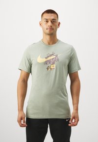 Nike Performance TEE SLUB - Camiseta deportiva - jade horizon