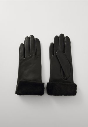 Gants en cuir noir avec un poignet en fausse fourrure noire douce. Présentent un design classique avec cinq doigts et une texture lisse.
