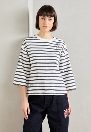 - Bluzka z długim rękawem