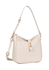 Borsa a mano in pelle beige con forma curva, hardware dorato, tracolla regolabile e chiusura a pattina. Superficie testurizzata con dettagli minimi.