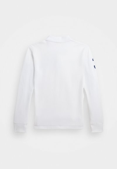 Long-sleeve white polo shirt with a soft texture, featuring a collar and navy accents on the left sleeve. Simple, clean design.