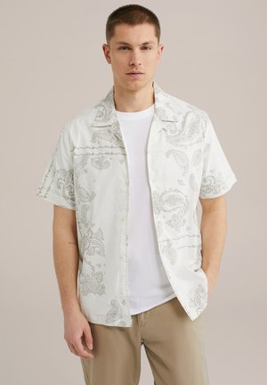 Korte mouw shirt van witte stof met een subtiele grijze paisleypatroon, knopen aan de voorkant en een relaxte pasvorm met een uitgespreide kraag.