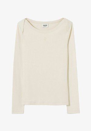 Chemise ajustée à manches longues couleur crème avec un col bateau et un logo subtil "CP" centré sous le col.