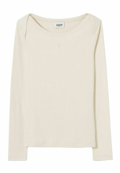 Camicia aderente a maniche lunghe di colore crema con scollatura a barca e discreto logo "CP" centrato sotto il colletto.