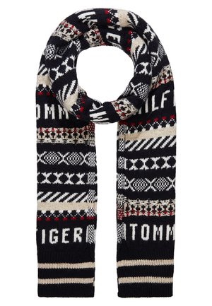 Zwart, wit, beige en rood gebreide sjaal met geometrische patronen en de tekst "TOMMY HILFIGER" verweven in afwisselende blokken.