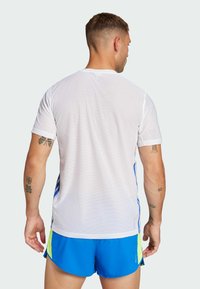 adidas Performance ADIZERO RETRO - Tekninen t-paita - white   lucid lemon
