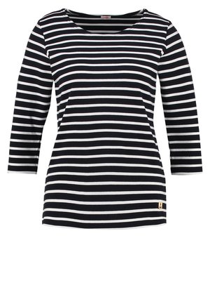 Chemise à rayures noires et blanches à manches longues avec un décolleté en forme de scoop, ornée d'un petit emblème d'ancre en or sur le bas à gauche.