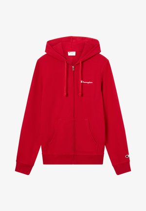 Sweat à capuche rouge zippé en tissu doux, avec une poche avant, une capuche ajustable avec cordons, et un logo "Champion" blanc.