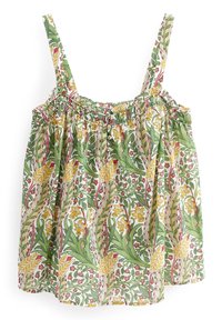 Udenærmet bluse med justerbare stropper, der har et grønt, gult og rødt blomstermotiv samt blade på en hvid baggrund.