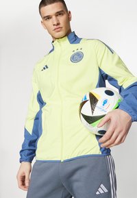 adidas Performance AJAX AMSTERDAM PRESENTATION JACKET - Træningsjakke - pulse yellow