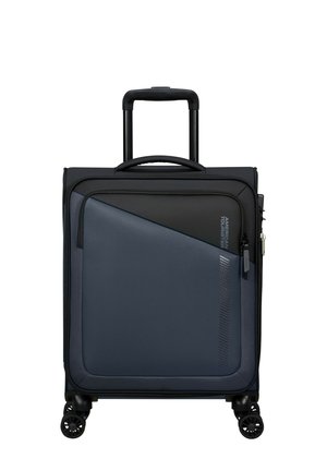 Valigia spinner con un rivestimento esterno blu scuro testurizzato, caratterizzata da un pannello superiore nero a contrasto, una maniglia telescopica e quattro ruote.