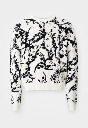White sweater with a black abstract pattern, ribbed cuffs and hem, round neckline, and a small logo patch on the bottom left side.