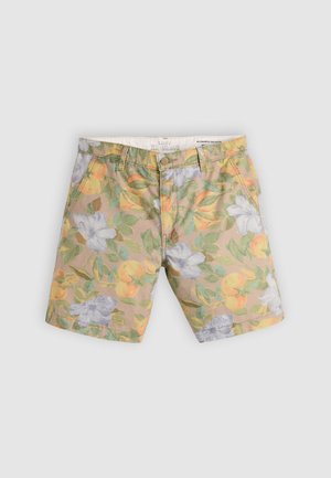 Meeste beežid chino lühikesed püksid värvilise lille- ja puuviljamustriga, ees nupp ja vööaasad heledal hallil taustal.