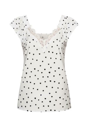 White top with black heart pattern, V-neckline adorned with lace trim, short puff sleeves, soft fabric, and relaxed fit.