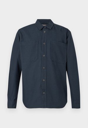 Long-sleeve dark navy button-up shirt with two large chest pockets and a classic collar, displayed against a white background.