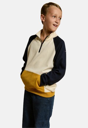 Fleece-Pullover in Creme, Marineblau und Senfgelb. Mit einem halben Reißverschluss am Hals, langen Ärmeln und einer Fronttasche. Sanfte Textur.