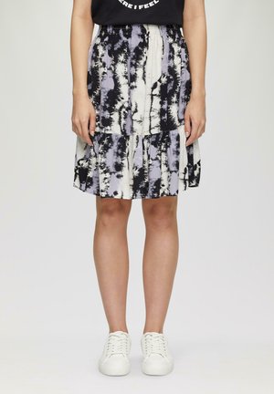 Floral-patterned skirt with layered ruffles, featuring shades of black, white, and lavender. Elastic waistband, lightweight fabric.