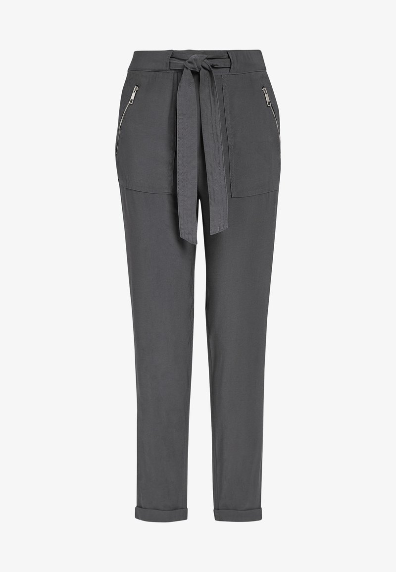 Pantalon gris avec taille à nouer, ourlets retroussés et poches avant zippées. En tissu lisse avec une coupe décontractée.