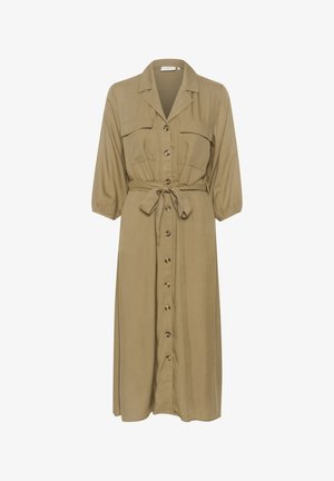 Khaki knapidret kjole med krave, korte puffærmer, to brystlommer, en taljebånd og en hel længde nederdel med knaplukning.