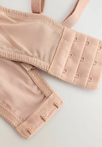 Lichtbeige beha met gaasstof. Verstelbare banden en een haak-en-oogsluiting met vijf lussen voor maatverstelling. Gladde textuur.