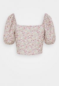 Top court floral avec un décolleté carré, des manches bouffantes et un fond clair. Présente de petits motifs de fleurs roses, vertes et jaunes.