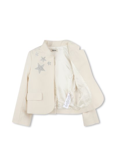 Blazer de couleur crème avec un col, orné d'embellissements en forme d'étoiles argentées sur le côté gauche et d'une doublure intérieure lisse.