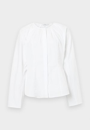 White long-sleeve blouse with a round neckline, pleated detailing on shoulders, and a straight cut. Made from smooth, lightweight fabric.