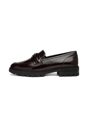 Dark brown glossy leather loafer with black chunky rubber sole and decorative buckle detail on the front side.