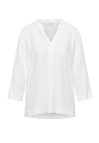 Blusa bianca con scollo a V, maniche a tre quarti e vestibilità comoda. Realizzata in tessuto morbido, presenta una piega centrale e un orlo dritto.