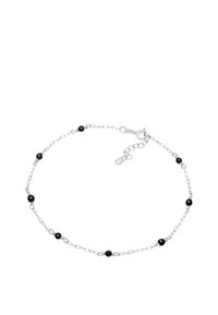 Silver chain bracelet with evenly spaced black beads. Features a lobster clasp and adjustable length with several loop options.