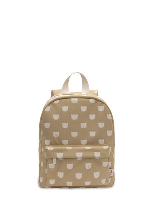 Sac à dos pour enfants beige avec motif de visages d'ours en peluche blancs, poche zippée à l'avant, poignées de transport blanches et bretelles réglables.