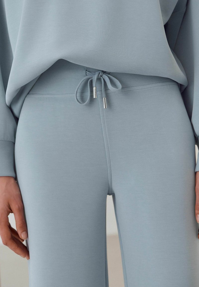 Next SOFT TOUCH WIDE  JOGGERS - Jogginghose - pale blue