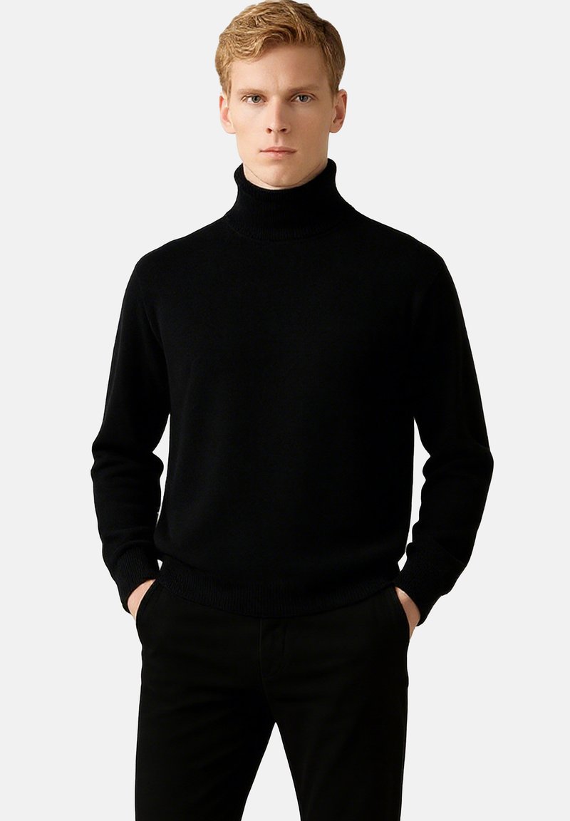 Schwarzer Rollkragenpullover aus einem weichen Strickstoff. Mit einer figurschmeichelnden Passform, langen Ärmeln sowie gerippten Bündchen und Saum.