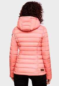 Light pink, puffer jacket with a hood, quilted design, and elastic cuffs. Features a patch on the left arm and a fitted silhouette.