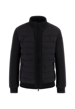 Black jacket featuring a quilted front and smooth, stretchy sleeves. Zippered closure with ribbed cuffs and hem. Two side pockets.
